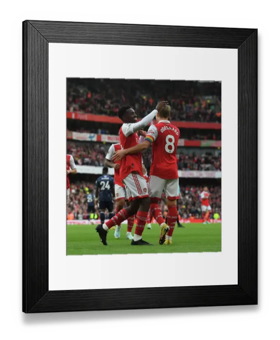 Framed Print : Arsenal's Five-Goal Blitz: Martin Odegaard and Eddie Nketiah Celebrate against Nottingham Forest (2022-23) Framed Print : Arsenal's Five-Goal Blitz: Martin Odegaard and Eddie Nketiah Celebrate against Nottingham Forest (2022-23)