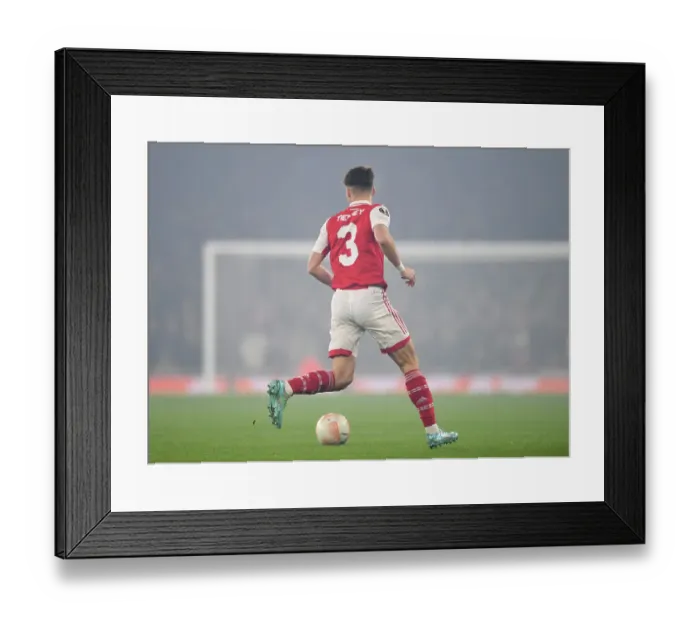 Framed Print : Arsenal's Kieran Tierney Stars in Europa League Victory over FC Zurich