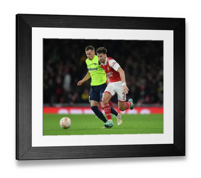 Framed Print : Arsenal's Kieran Tierney Goes Head-to-Head with Nikola Boranijasevic in UEFA Europa League Showdown Framed Print : Arsenal's Kieran Tierney Goes Head-to-Head with Nikola Boranijasevic in UEFA Europa League Showdown