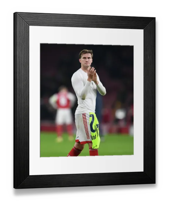 Framed Print : Arsenal Celebrate Victory Over FC Zurich in Europa League Group Stage