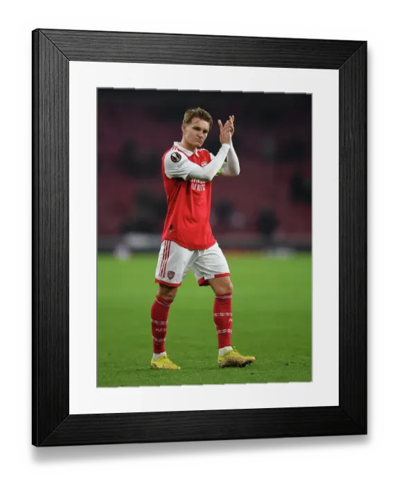 Framed Print : Arsenal Celebrates Europa League Victory: Martin Odegaard Rallies Fans