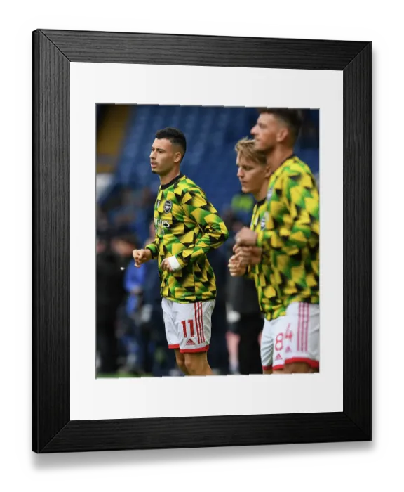 Framed Print : Gabriel Martinelli's Focused Warm-Up: Arsenal Star Prepares for Chelsea Showdown - Premier League 2022-23