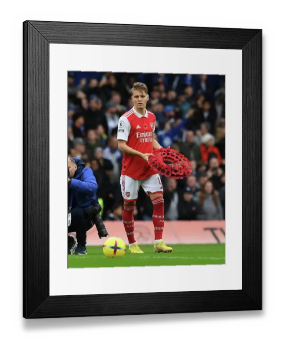 Framed Print : Martin Odegaard Pays Tribute at Stamford Bridge Ahead of Chelsea vs. Arsenal (Premier League 2022-23)