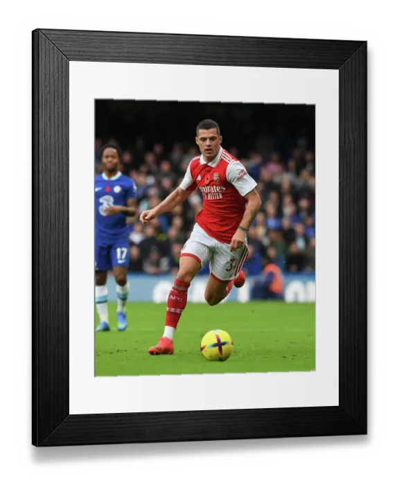 Framed Print : Xhaka Faces Off: Chelsea vs. Arsenal, Premier League 2022-23