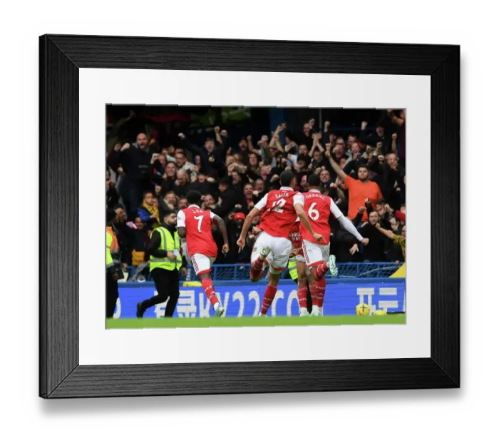 Framed Print : Arsenal's Magalhaes and Saka Celebrate Goal Against Chelsea in 2022-23 Premier League Framed Print : Arsenal's Magalhaes and Saka Celebrate Goal Against Chelsea in 2022-23 Premier League