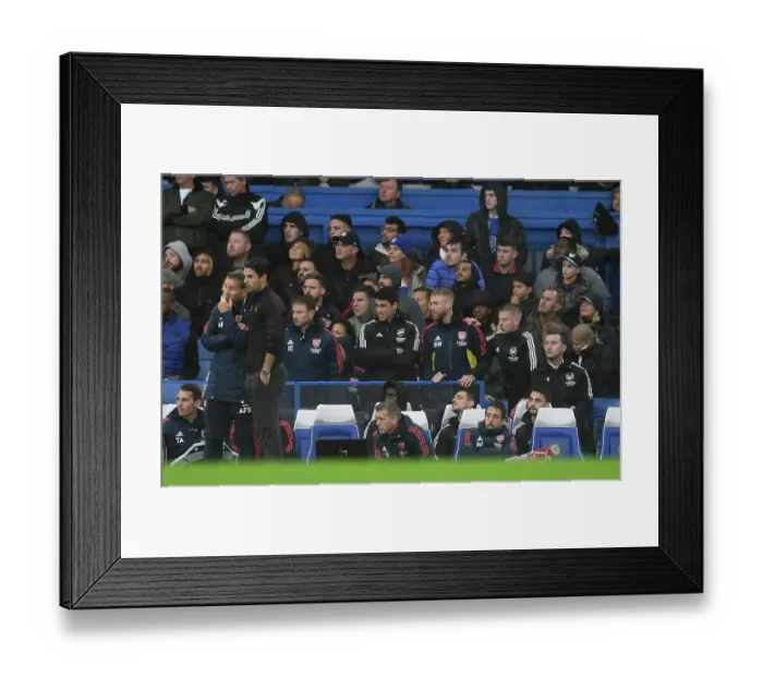 Framed Print : Arsenal Manager Mikel Arteta Discusses Tactics with Assistant Coach Albert Stuivenberg during Chelsea vs Arsenal (2022-23) Framed Print : Arsenal Manager Mikel Arteta Discusses Tactics with Assistant Coach Albert Stuivenberg during Chelsea vs Arsenal (2022-23)