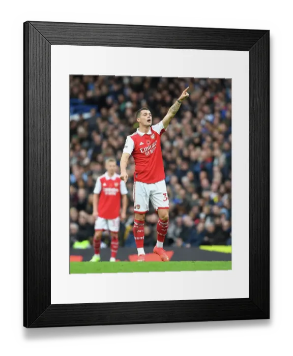 Framed Print : Granit Xhaka: Battle at Stamford Bridge - Chelsea vs. Arsenal 2022-23 Framed Print : Granit Xhaka: Battle at Stamford Bridge - Chelsea vs. Arsenal 2022-23