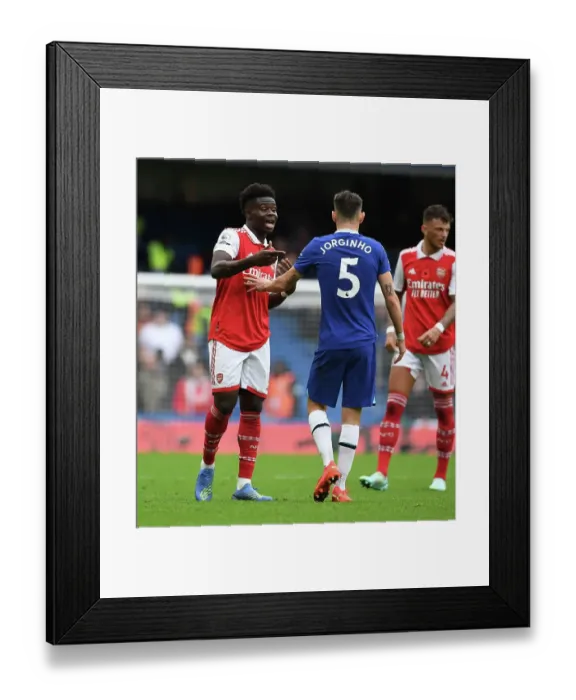 Framed Print : Clash at Stamford Bridge: Bukayo Saka and Jorginho's Heated Altercation Framed Print : Clash at Stamford Bridge: Bukayo Saka and Jorginho's Heated Altercation