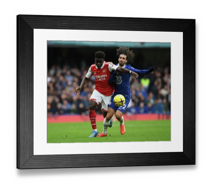 Framed Print : Saka vs. Cucurella: A Wingers Battle at Stamford Bridge Framed Print : Saka vs. Cucurella: A Wingers Battle at Stamford Bridge