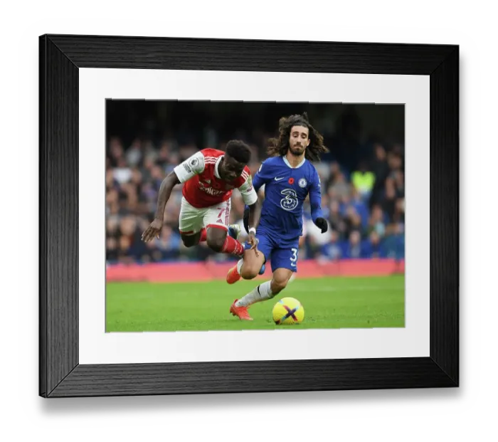 Framed Print : Saka vs. Cucurella: A Premier League Showdown at Stamford Bridge