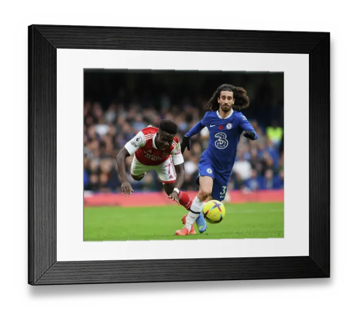 Framed Print : Saka vs. Cucurella: A Premier League Battle at Stamford Bridge Framed Print : Saka vs. Cucurella: A Premier League Battle at Stamford Bridge