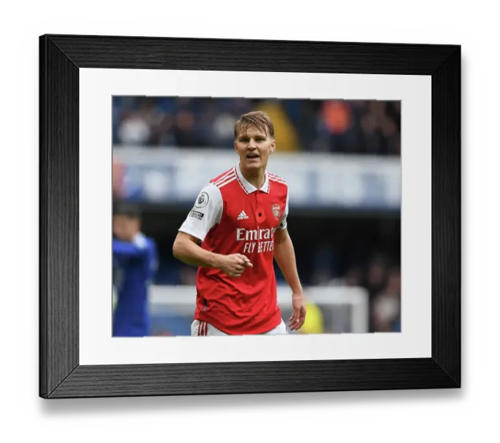 Framed Print : Arsenal's Martin Odegaard Faces Off Against Chelsea in Premier League Showdown (2022-23) Framed Print : Arsenal's Martin Odegaard Faces Off Against Chelsea in Premier League Showdown (2022-23)