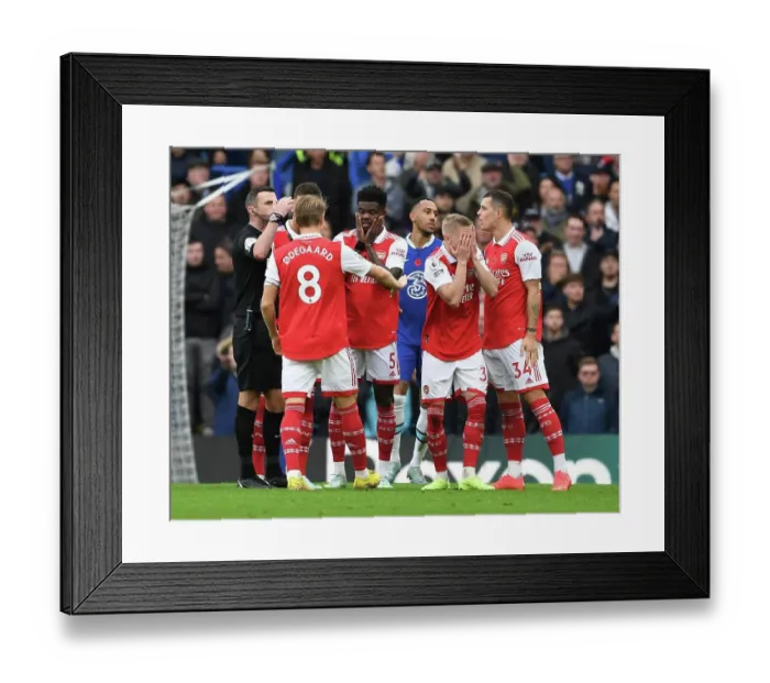 Framed Print : Arsenal Players Protest to Referee During Chelsea vs Arsenal Premier League Clash (2022-23) Framed Print : Arsenal Players Protest to Referee During Chelsea vs Arsenal Premier League Clash (2022-23)