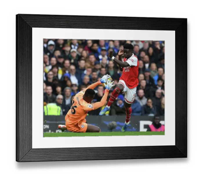 Framed Print : Saka vs. Mendy: A Premier League Battle at Stamford Bridge