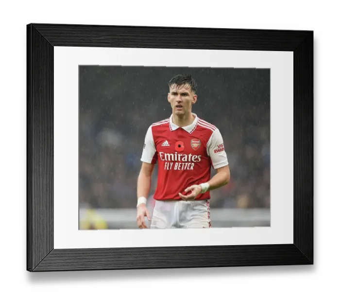 Framed Print : Arsenal's Kieran Tierney Faces Off Against Chelsea in Intense Premier League Clash (2022-23)