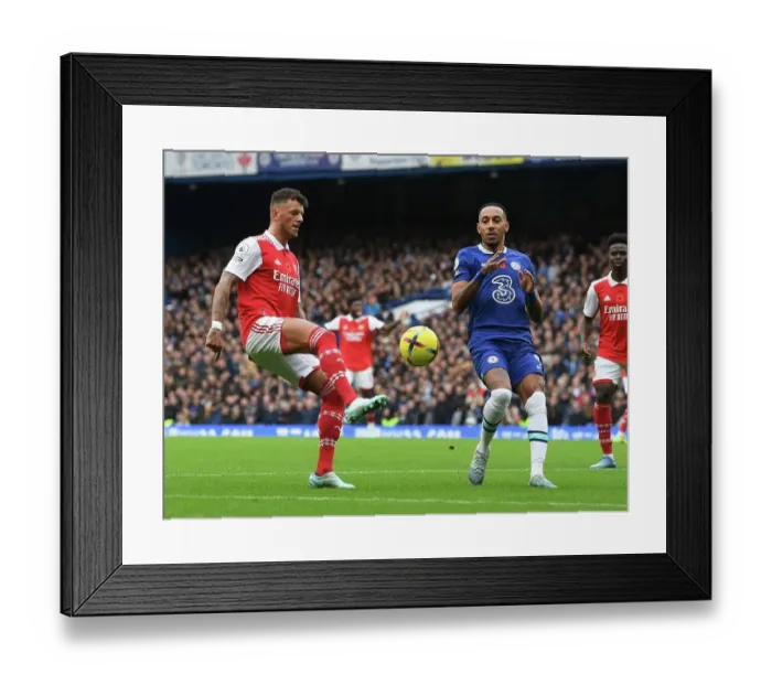 Framed Print : Clash of Stars: Aubameyang vs. White - Premier League 2022-23: Battle at Stamford Bridge (Chelsea vs. Arsenal)