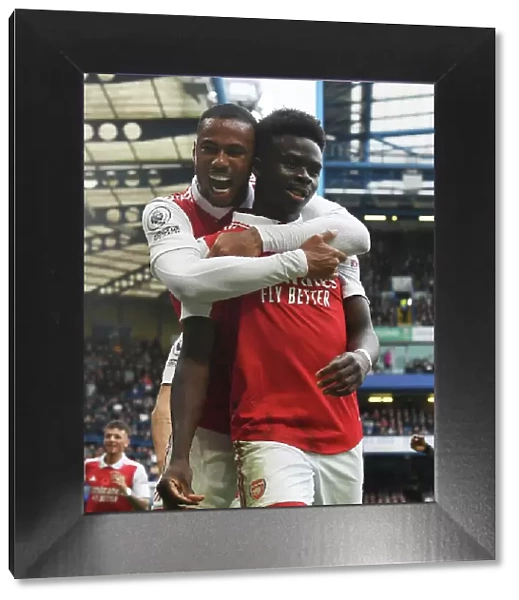 Gabriel and Saka Celebrate Arsenal's Goal Against Chelsea in Premier League Clash (2022-23)