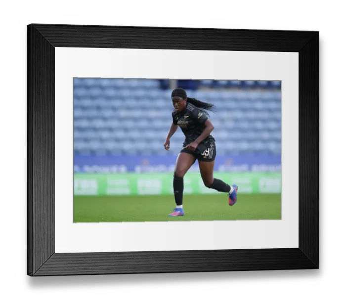 Framed Print : Arsenal's Michelle Agyemang Goes Head-to-Head with Leicester City in Women's Super League Clash