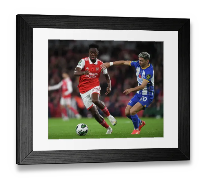 Framed Print : Arsenal's Lokonga Clashes with Enciso in Intense Carabao Cup Battle Framed Print : Arsenal's Lokonga Clashes with Enciso in Intense Carabao Cup Battle