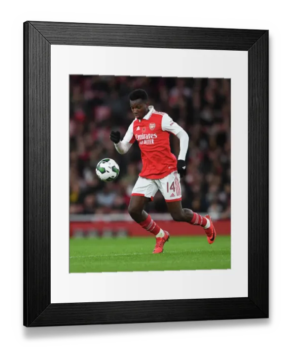 Framed Print : Arsenal's Eddie Nketiah in Action during Carabao Cup Clash Against Brighton Framed Print : Arsenal's Eddie Nketiah in Action during Carabao Cup Clash Against Brighton