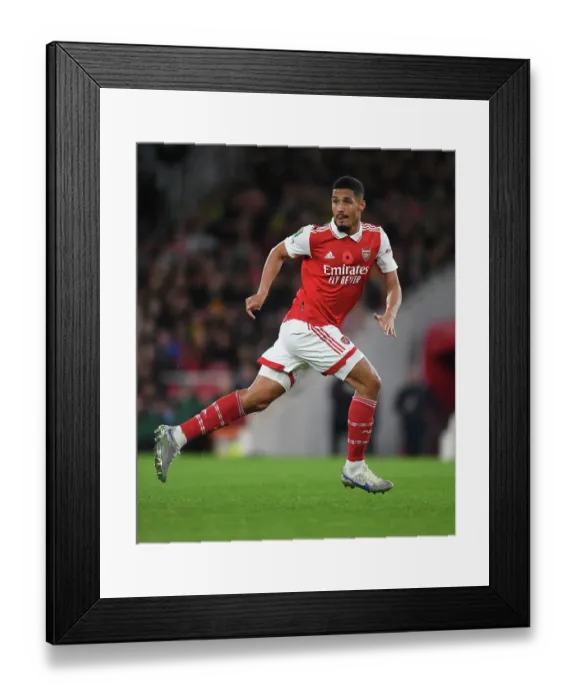 Framed Print : Arsenal's Saliba Shines: Carabao Cup Battle Against Brighton Framed Print : Arsenal's Saliba Shines: Carabao Cup Battle Against Brighton