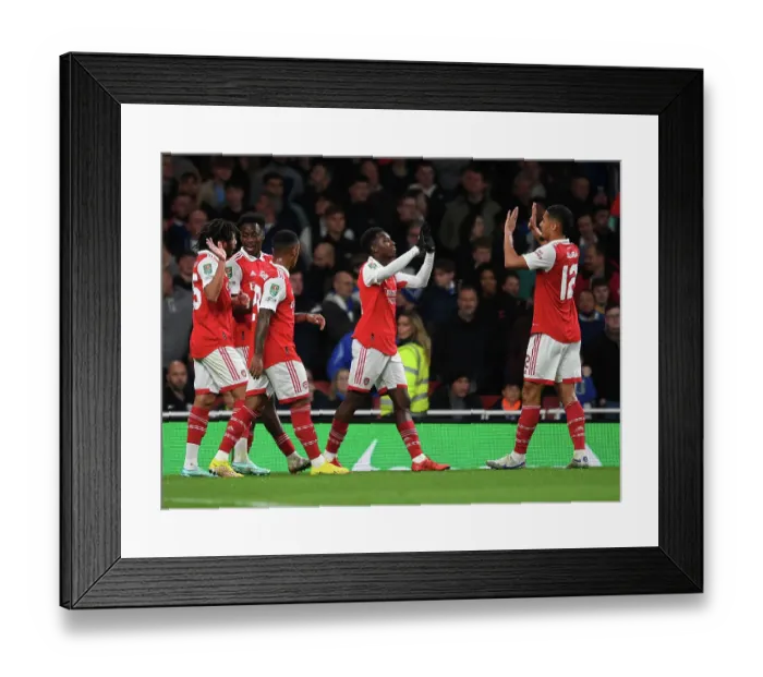 Framed Print : Arsenal's Eddie Nketiah Scores and Celebrates with Team against Brighton in Carabao Cup