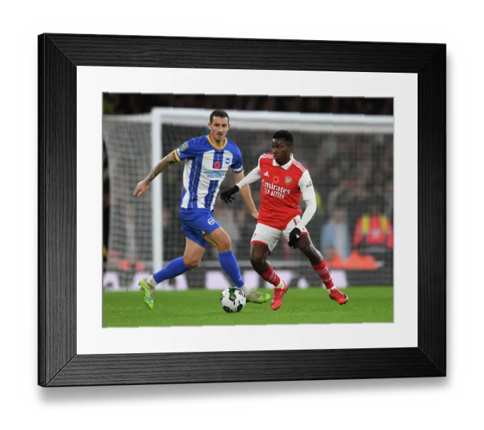 Framed Print : Arsenal vs Brighton: Nketiah vs Dunk - Carabao Cup Clash at Emirates Stadium