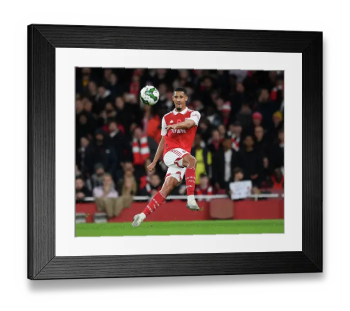 Framed Print : William Saliba's Star Debut: Arsenal's Carabao Cup Victory over Brighton