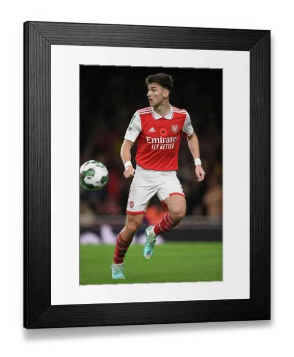 Framed Print : Arsenal's Kieran Tierney Stars in Carabao Cup Victory Over Brighton & Hove Albion