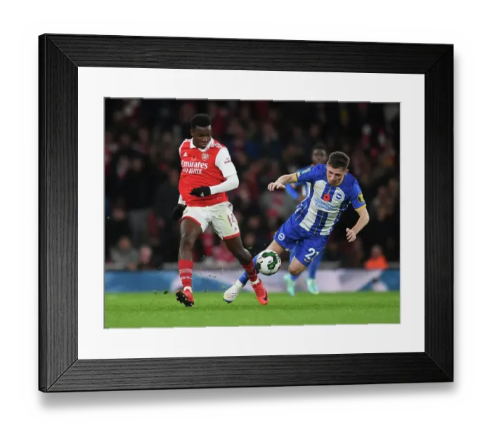 Framed Print : Arsenal vs Brighton: Eddie Nketiah Clashes with Billy Gilmour in Carabao Cup Showdown
