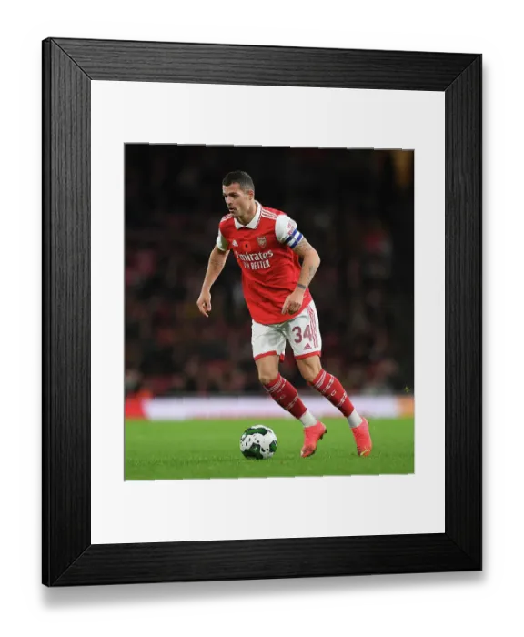 Framed Print : Granit Xhaka in Action: Arsenal vs Brighton & Hove Albion, Carabao Cup 2022-23