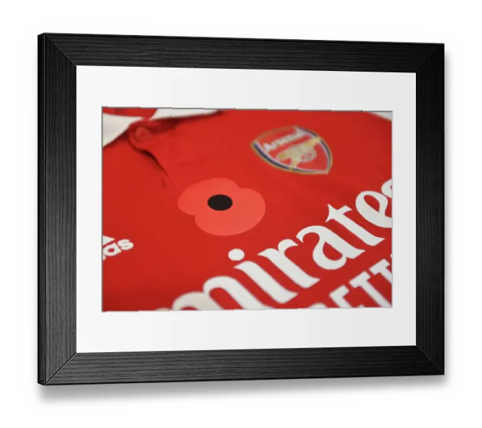 Framed Print : Arsenal's Poppy-Emblazoned Jerseys: Arsenal vs Brighton & Hove Albion in Carabao Cup 2022-23
