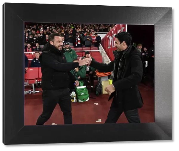 Mikel Arteta and Roberto De Zerbi Exchange Handshakes: Arsenal vs. Brighton in Carabao Cup Clash at Emirates Stadium