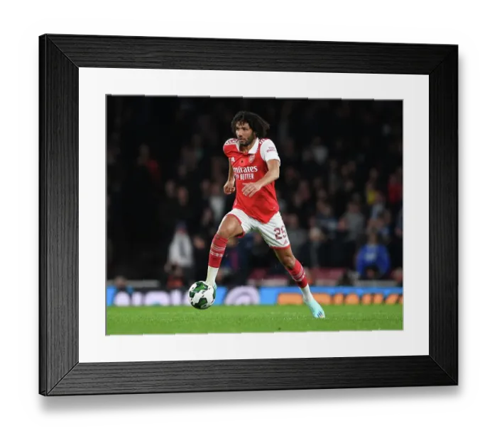 Framed Print : Arsenal's Mo Elneny: Concentration and Determination in Carabao Cup Clash Against Brighton & Hove Albion