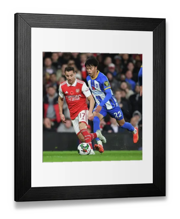 Framed Print : Arsenal vs Brighton: Cedric Outruns Mitoma in Carabao Cup Clash Framed Print : Arsenal vs Brighton: Cedric Outruns Mitoma in Carabao Cup Clash