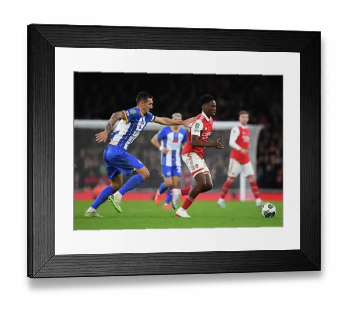 Framed Print : Arsenal's Sambi Outmaneuvers Brighton's Dunk in Carabao Cup Clash Framed Print : Arsenal's Sambi Outmaneuvers Brighton's Dunk in Carabao Cup Clash