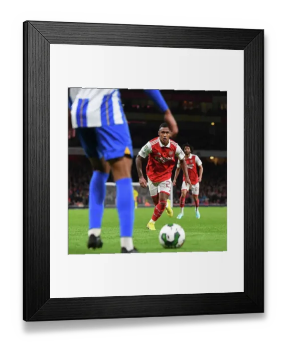 Framed Print : Marquinhos in Action: Arsenal vs. Brighton - Carabao Cup Showdown