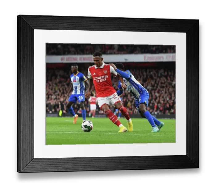 Framed Print : Marquinhos in Action: Arsenal vs Brighton & Hove Albion - Carabao Cup Clash at Emirates Stadium