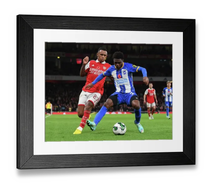 Framed Print : Arsenal vs Brighton: Marquinhos vs Lamptey Clash in Carabao Cup Third Round