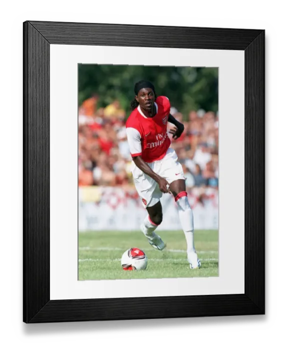 Framed Print : Adebayor's Unstoppable Debut: Arsenal's 1:8 Pre-Season Triumph Over Schwadorf (July 31, 2006)