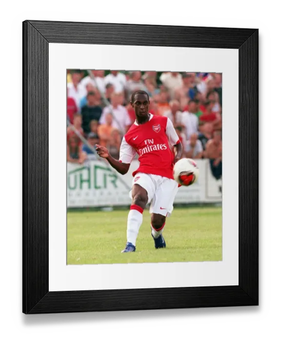 Framed Print : Arsenal's Unstoppable Pre-Season Performance: Justin Hoyte Shines in 8-1 Victory over Schwadorf, Austria, 2006
