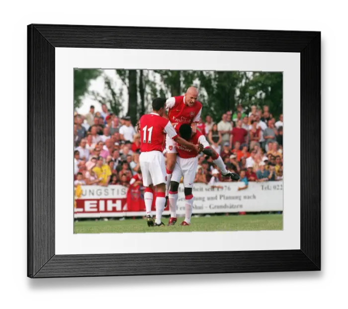 Framed Print : Triumphant Threesome: Kolo Toure, Pascal Cygan, and Robin van Persie Celebrate Arsenal's Pre-Season Goal Framed Print : Triumphant Threesome: Kolo Toure, Pascal Cygan, and Robin van Persie Celebrate Arsenal's Pre-Season Goal