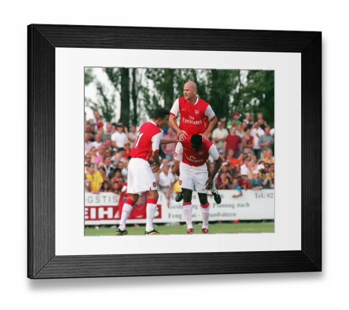 Framed Print : Kolo Toure celebrates scoring a goal for Arsenal with Pascal Cygan and Robin van Persie