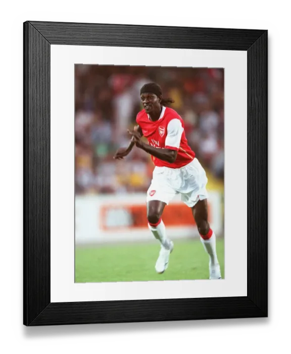 Framed Print : Adebayor's Debut: Arsenal Overpowers SV Mattersburg 2-1 in Pre-Season Friendly