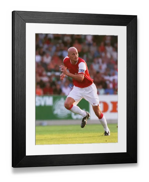 Framed Print : Pascal Cygan in Action: Arsenal's Win Against SV Mattersburg, 2006