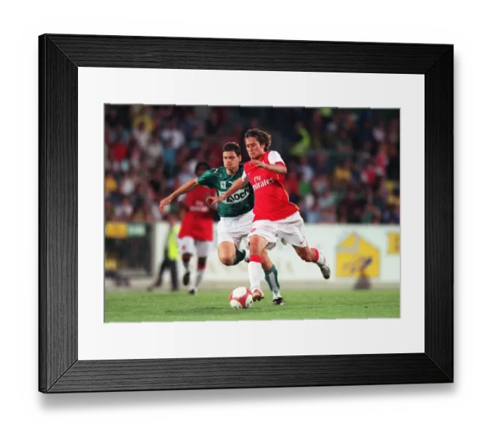 Framed Print : Thomas Rosicky's Brilliant Performance: Arsenal's 2-1 Victory Over SV Mattersburg (2006)