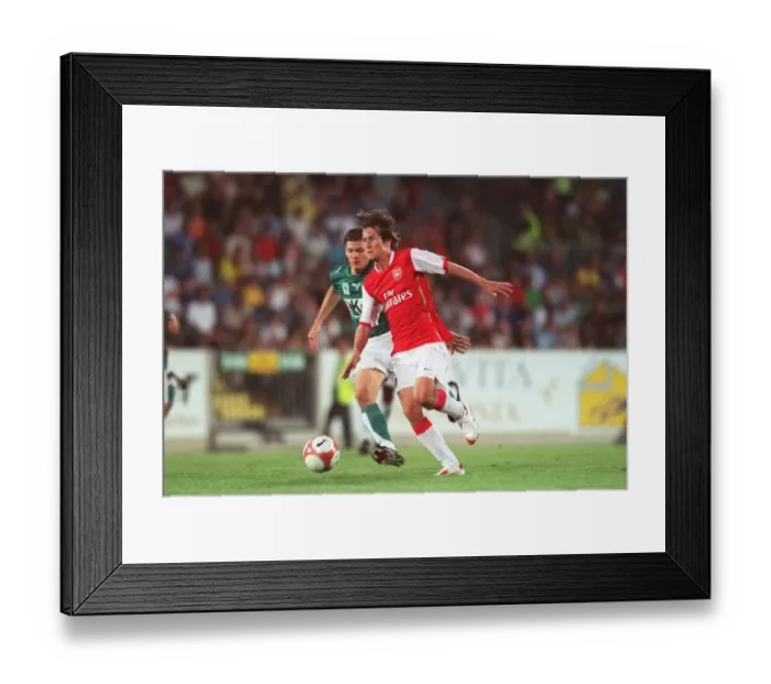 Framed Print : Thomas Rosicky's Brilliant Performance: Arsenal's 2-1 Victory Over SV Mattersburg (2006) Framed Print : Thomas Rosicky's Brilliant Performance: Arsenal's 2-1 Victory Over SV Mattersburg (2006)