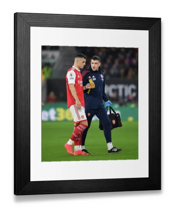 Framed Print : Granit Xhaka's Injury Exit: Wolverhampton Wanderers vs. Arsenal FC, Premier League 2022-23 Framed Print : Granit Xhaka's Injury Exit: Wolverhampton Wanderers vs. Arsenal FC, Premier League 2022-23