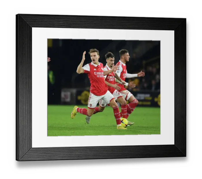 Framed Print : Arsenal's Odegaard, Vieira, and White in Action: Premier League 2022-23 - Wolverhampton Wanderers vs. Arsenal
