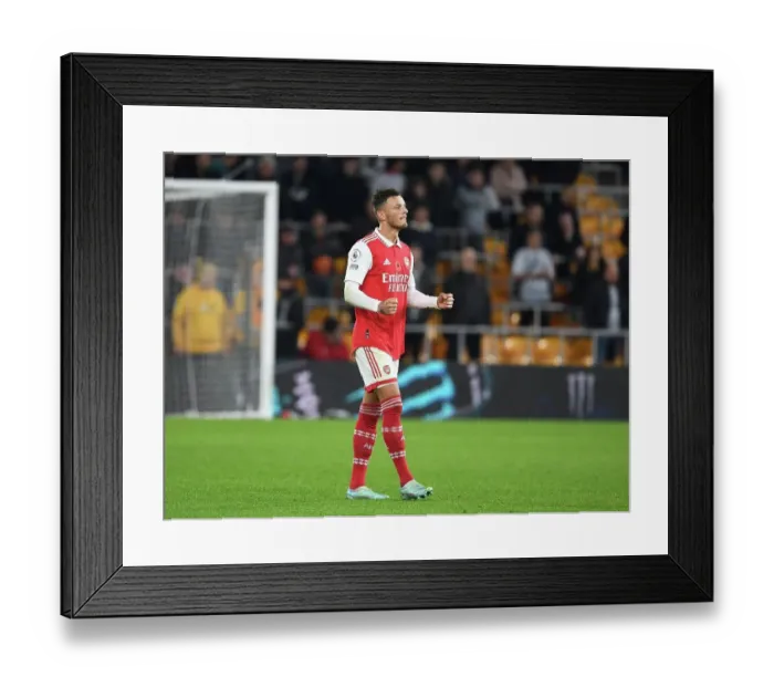 Framed Print : Ben White's Euphoric Moment: Arsenal Secure Hard-Fought Victory Over Wolverhampton Wanderers